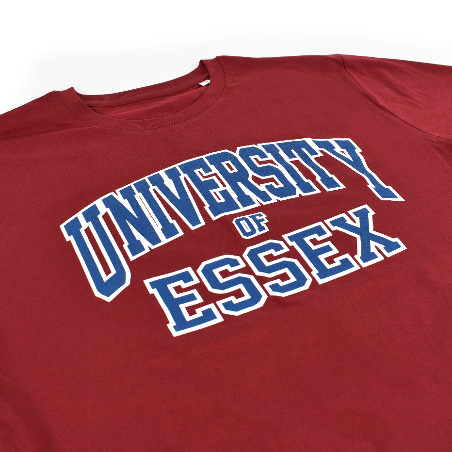 Burgundy Organic T-Shirt with "University of Essex" printed on the front in varsity style font, close-up on design